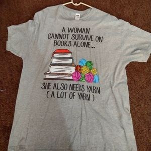 Books and yarn shirt in a gray color and a size extra large